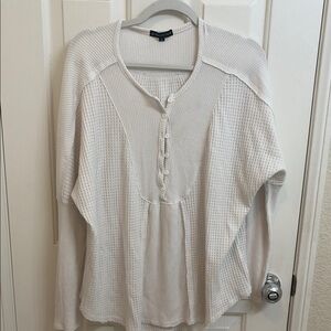 Gibson look . White long sleeve blouse, front bottoms.